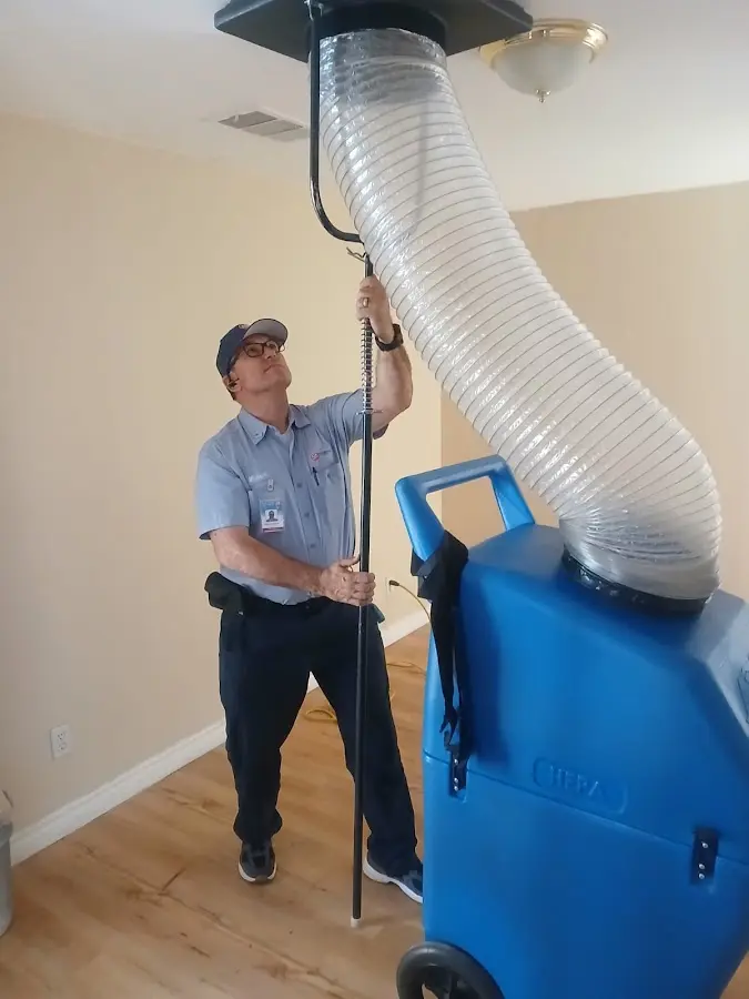 Furnace Tune-Up technician using HEPA equipment in Ridley Park